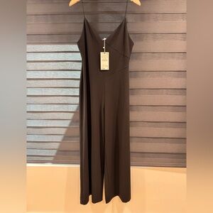 Zara Black Jumpsuit brand new never worn with tags 
Size L